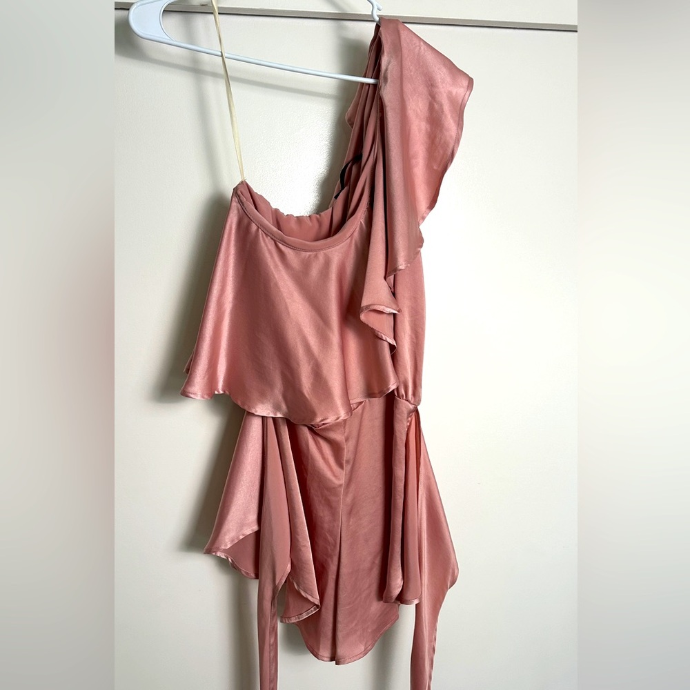 Off shoulder silky pink dress.